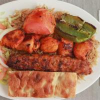 #19 · this platter is served with one lamb tikka (Lamb legs cut into cubs and marinated in our own...