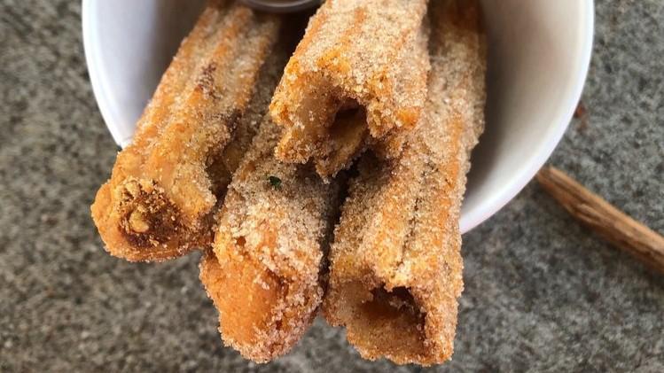 Dulce De Leche · Two churros. Hand-filled dulce de leche chrruos. Mexican cinnamon-sugar served with a cajeta dipping sauce.