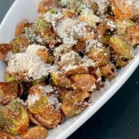 BRUSSELS SPROUTS · Lightly fried Watsonville Brussels sprouts, grana padano