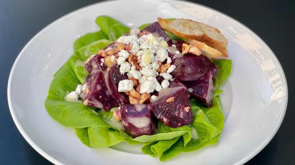 ROASTED BEETS · Red beets, butter lettuce, roasted hazelnut, crumbled goat cheese, croutons, lemon dressing