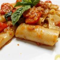 DEL CONSOLE PACCHERI · Rustichella Pasta, spicy Nduja Calabrese, onion, cherry tomato, bread crumbs, Grana Padano