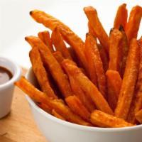 Basket of Sweet Potato Fries · Golden sweet potato chopped and fried!
