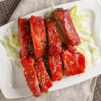 Barbecued Pork Spareribs (4) · Meaty pork spareribs marinated in Chinese barbecue sauce, then roasted.