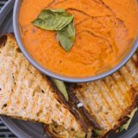 Tomato Soup & Grilled Three-Cheese Panino · Made-from-scartch tomato soup served with a dunkable three-cheese grilled sandwich on fresh ...