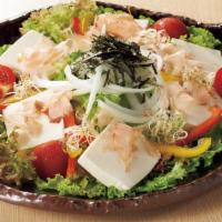 960. Tofu Salad · Greens, tofu, bonito flakes, onion, tomato , seaweed with shoyu vinaigrette dressing.
