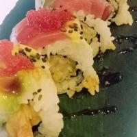 Aka-Dragon Roll · Shrimp tempura topped with tuna, avocado, eel sauce, sesame seed and red tobiko.