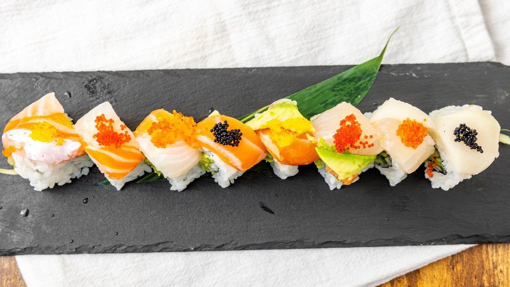 Niji Roll · Red crab meat, cucumber topped with assorted fish, avocado, tobiko.