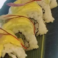 Caterpillar Roll · Asparagus, tamago, kaiwares topped with avocado, ponzu daikon and bull-blood leaf.