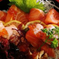 Umi Masu & Sake Donburi · Ocean trout, ocean trout belly, salmon, salmon belly. Two pieces each and it comes with Ikura.