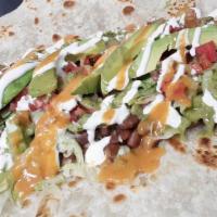 Burrito Vegetariano · Rice, Beans, Cheese, Cream, Grilled Bell Peppers, Grilled Mushrooms. Grilled Onions, Lettuce...