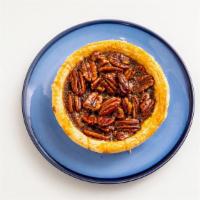 Pecan Pie · Our version of pecan pie has a hint of maple, and is not overly sweet.