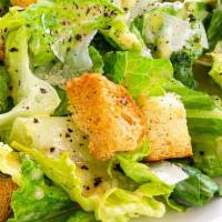 Caesar Salad · Romaine Lettuce, Cherry Tomatoes, Shredded Parmesan, Olive Oil, Croutons with Caesar Dressing.