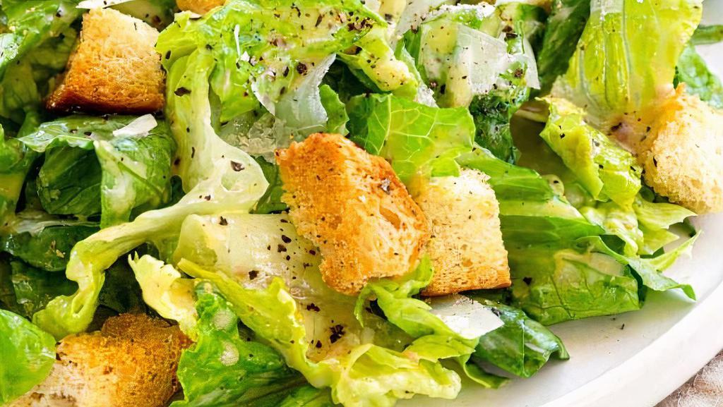 Caesar Salad · Romaine Lettuce, Cherry Tomatoes, Shredded Parmesan, Olive Oil, Croutons with Caesar Dressing.