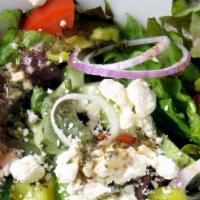 Greek Salad · Romaine Lettuce, Olive Oil, Red Onions, Green Olives, Sliced Cucumbers, Tomatoes, Oregano, B...