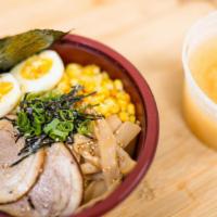 Miso Ramen            · House make soup two-piece chashu pork, corn, scallion, menma, nori ,soft egg.