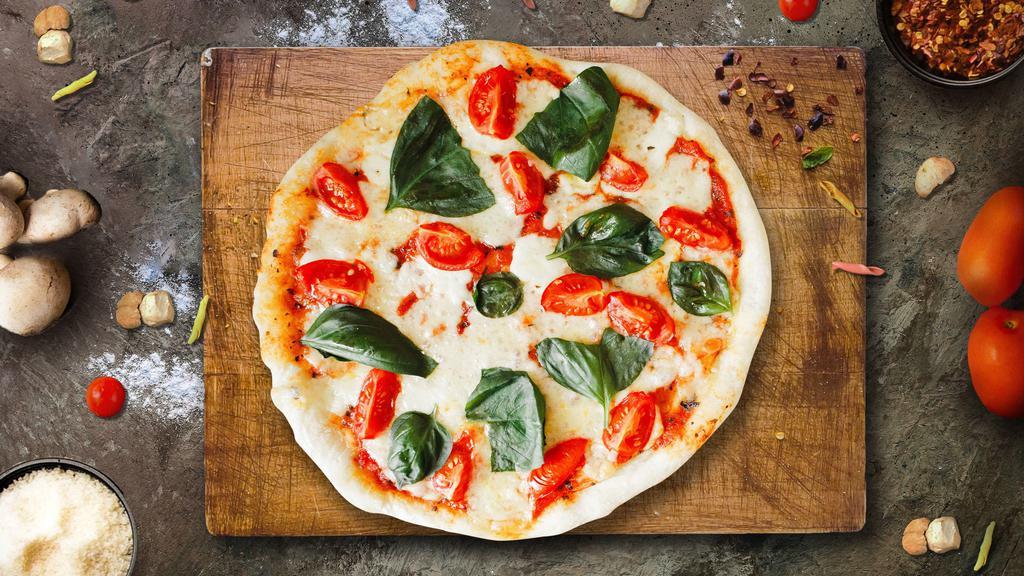 Mary Margherita Pizza · Fresh basil, tomatoes, and mozzarella cheese baked on a hand-tossed dough.