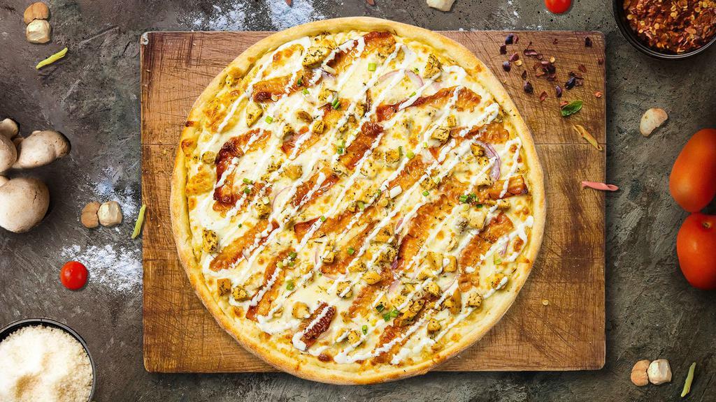 Pizza Peninsula Special · Ranch sauce, marinated chicken, green onions, fresh tomatoes, bacon, and garlic baked on a hand-tossed dough.