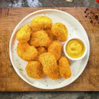 Cluck Chuck Nuggets · Bite sized nuggets of chicken breaded and fried until golden brown. Served with your choice ...