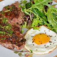 Prime New York Steak and Eggs · Prime New York steak with two eggs any style served with French fries, homemade bread and jam.