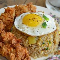 Fried Chicken Fried Rice · Thai fried rice with scallion, pineapple, cranberry, cashew nut, crispy fried chicken, fried...