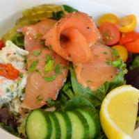 Homemade Smoked salmon salad · Mixed green, grape tomato, cucumber, beet, lemon, pickle, honey mustard potato salad (celery...