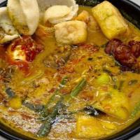 Gulai Sapi - BEEF Curry · Beef brisket, green beans, tofu, chayote, jackfruit and carrots braised in yellow curry, fin...