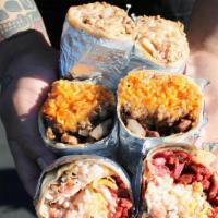 Chamorro Burrito · Grilled BBQ pork wrapped in a flour tortilla shell with chamorro red rice, cheese, pico de g...