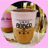 Pink Haze · Vietnamese Iced Coffee. Hazelnut. Pink Salted Cream. Dusted with Imported Chocolate.