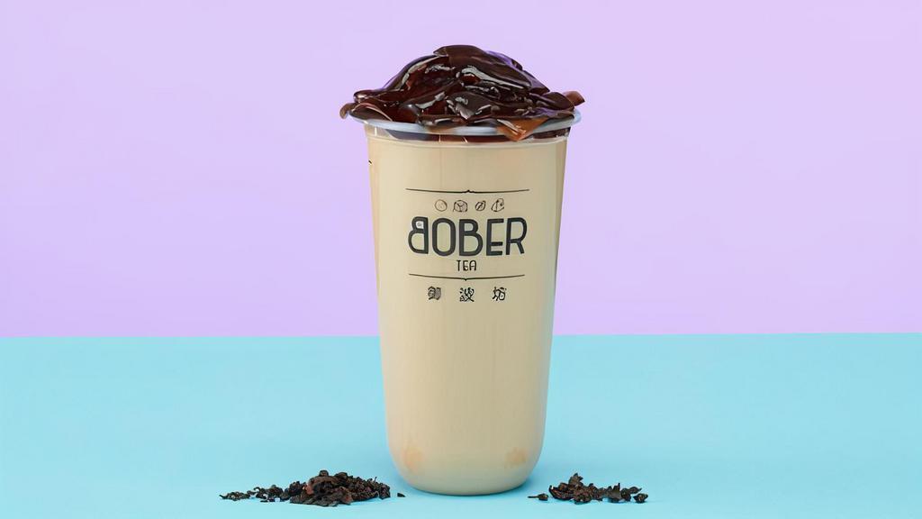 Roasted Oolong Milk Tea · Made with our freshly brewed premium-grade roasted oolong loose leaf tea. Nutty and aromatic
. **pictured brown sugar konjac jelly not included**.