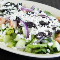 Greek Salad · Romaine lettuce, kalamata olives, cucumbers, feta cheese, red onions, tomatoes, and Italian ...