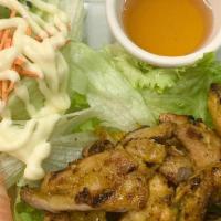 Grilled Chicken · Grilled marinated chicken with Thai herbs. Served with sweet and sour sauce and fresh green ...