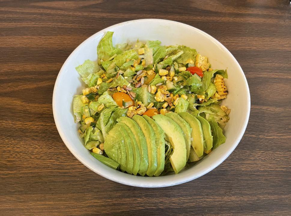 GLK Chopped Salad · romaine, avocado, sunflower seeds, grilled corn, tomato, english cucumber, basil vinaigrette, (all togo salads come dressing on the side) (vegan/GF)