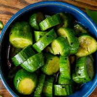 Jean's Persian Cucumbers · Bragg’s liquid aminos, garlic, sesame oil, black sesame seeds (vegan/GF)