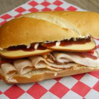 6. Smoke Jumper · Smoked turkey, bacon, smoked Gouda cheese, roasted red peppers, caramelized onion, mayo, BBQ...