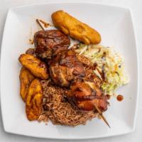 Jerk Chicken Plate · Dark meat chicken marinated in the world famous Jerk Spices then slow smoked . Sweet and spi...