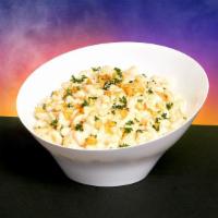 Garlic Parmesan Mac And Cheese · Classic mac and cheese topped with grated garlic and fresh Parmesan .