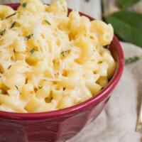 Truffle Mac and Cheese · Classic mac and cheese with truffle oil.