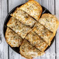 Garlic Cheese Bread  · Fresh baked bread with melted mozzarella cheese and fresh garlic. Served with a side of mari...