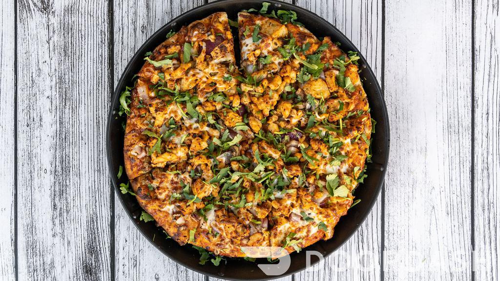 East Meets West (Chicken Tikka with Pepperoni) · Masala marinated chicken, pepperoni, red onions, bell peppers, fresh cilantro with Mozzarella cheese and creamy curry sauce.