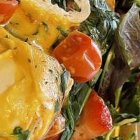 Florentine Benny · Spinach, cherry tomato and topped with Parmesan. Easy poached eggs on English muffin topped ...