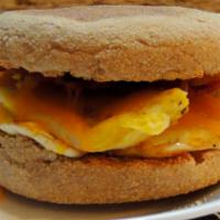 Whoa! Bacon, Egg, and Cheese · Bacon, Scrambled Egg, and Cheddar Cheese between 2 Pancakes and served with Maple Syrup on t...