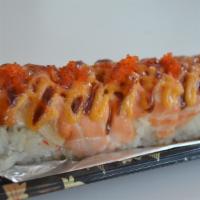 Lion King Roll (Spicy) · Imitation crab meat, avocado, topped with baked salmon, spicy sauce and mayo.