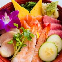 Chirashi Bowl · Salmon sashimi, tuna sashimi, hamachi sashimi, shrimp, egg, cucumber, seaweed and rice