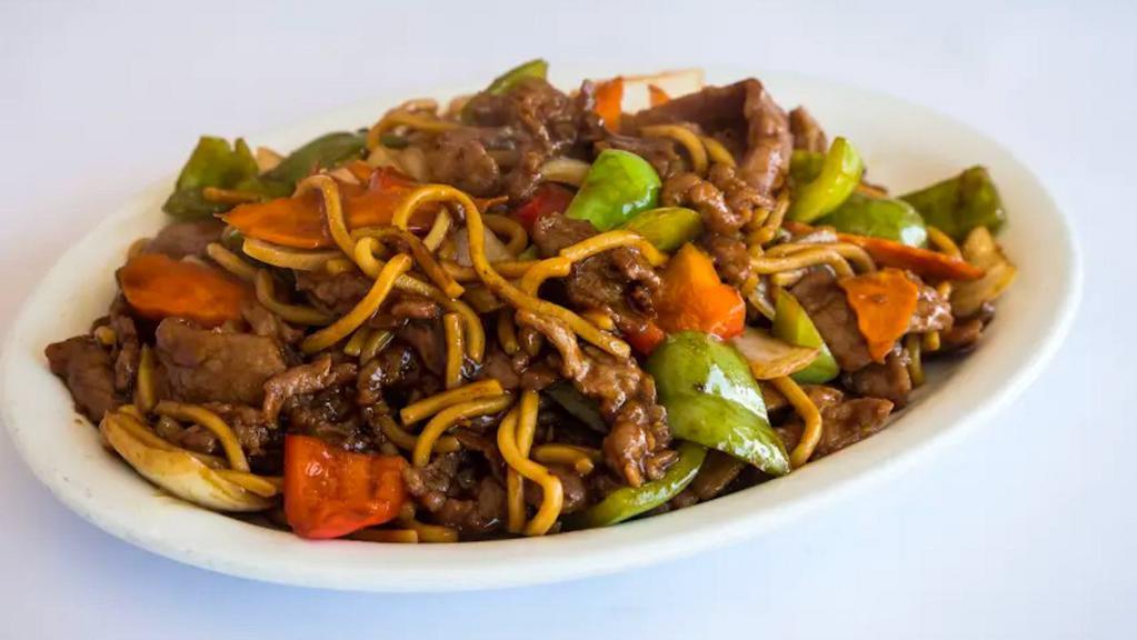 Green Pepper Beef · Flank steak beef sauteed with bell peppers and white onions.
