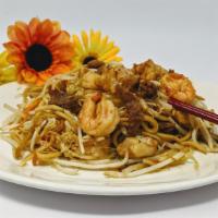 House Chow Mein · House chow mein includes shrimp, chicken and beef.