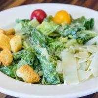 Side Salad · Mixed greens, tomato, and choice of dressing.
