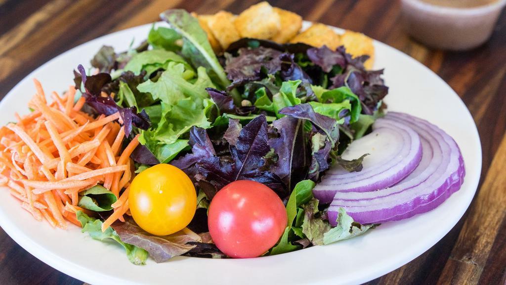 House Salad · Mixed greens, cherry tomato. Croutons and choice of dressing.