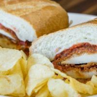 Chicken Parm Sub · Bread chicken breast on a soft roll with melted mozzarella and marinara.