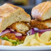 The Chicken Pollo · Breaded chicken breast on a soft roll served with lettuce, tomato, onion and melted cheese.