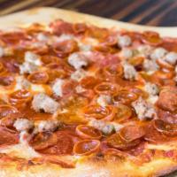 Meat Lovers · Starting with our beer-infused crust and then in-house marinara then we add canadian bacon i...